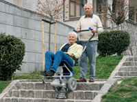 Powered universal wheelchair stairclimber, 130kg